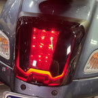 SMOKED G3 LED TAILLIGHT ASSEMBLY W/MATTE BLACK BEZEL 2015-2022 VESPA GTS SUPER SPORT 300 HPE