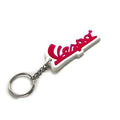 VESPA SCRIPT KEY CHAIN WHITE BACKGROUND RED LETTERING