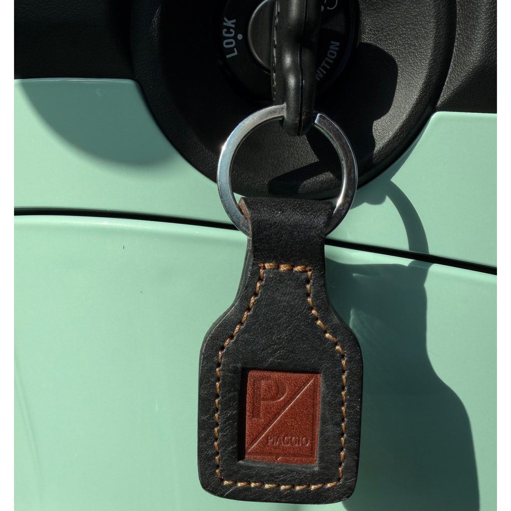 PIAGGIO SHIELD TAN/BLACK ALL LEATHER KEYCHAIN