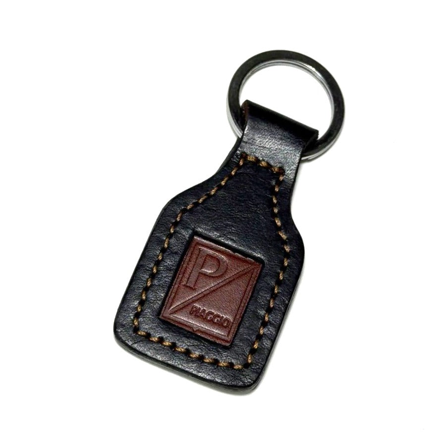 PIAGGIO SHIELD TAN/BLACK ALL LEATHER KEYCHAIN
