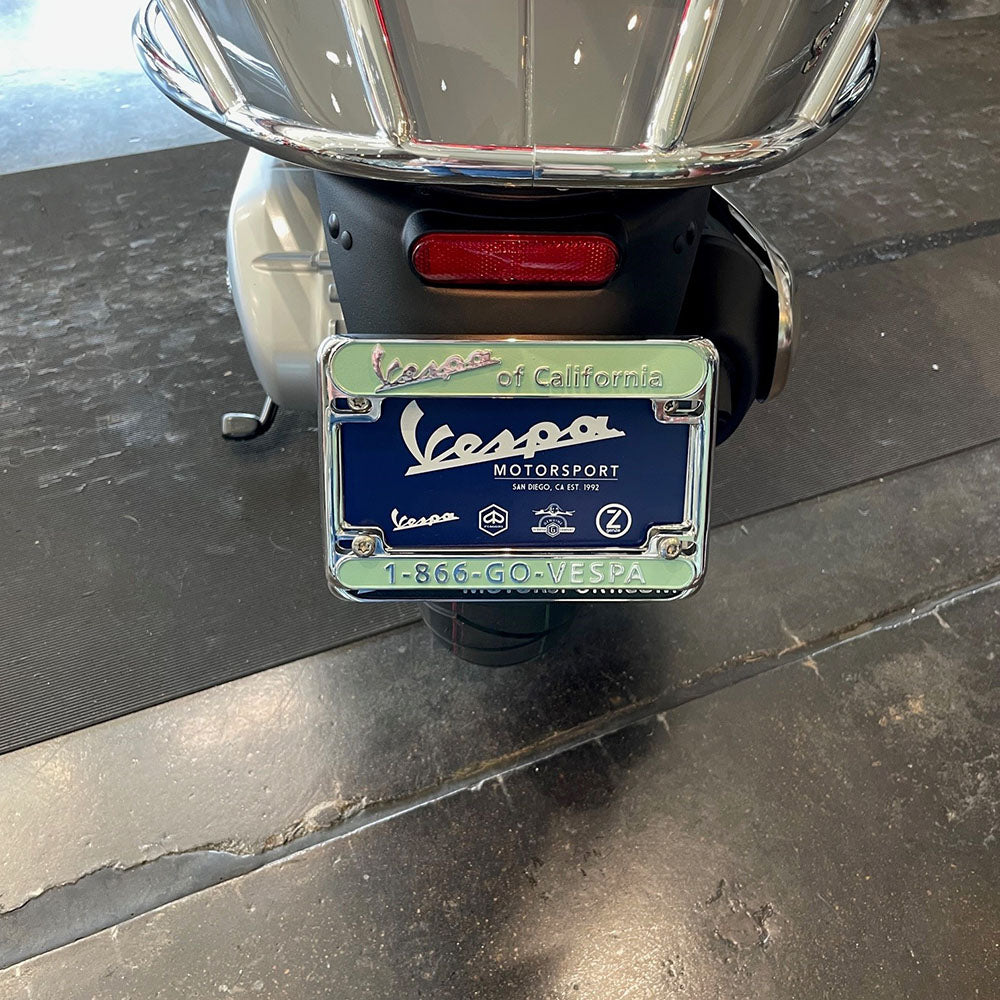 "VESPA of CALIFORNIA" CHROME & GREEN LICENSE PLATE FRAME (NEW OLD STOCK)