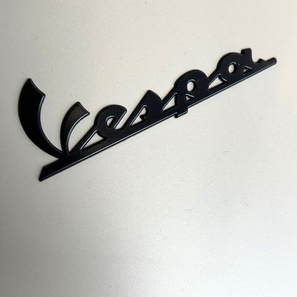 'VESPA' MATTE BLACK STICKER LEGSHIELD BADGE (EMBLEM) 4 INCHES LONG
